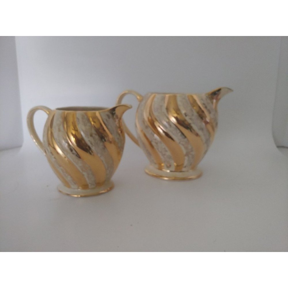 VINTAGE GOLD & CREAM SADLER PITCHERS